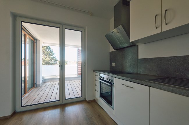 Küche mit Zugang zur Loggia Küche mit Zugang zur Loggia