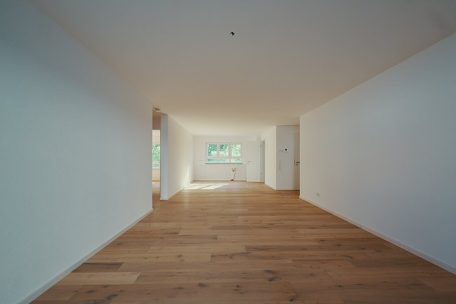 Wohnbereich mit Blick zum Küchenbereich Wohnbereich mit Blick zum Küchenbereich
